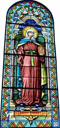 Sainte Thècle tient à la main les trois doigts de Saint Jean Baptiste qu’elle a rapporté